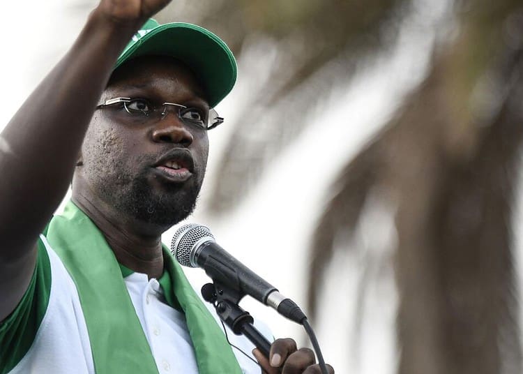 (FILES) The opponent Ousmane Sonko, mayor of Ziguinchor, speaks during a rally of the Senegalese opposition at the Place de l'Obelisque in Dakar, on June 8, 2022. Senegalese opposition figure Ousmane Sonko was arrested on July 28, 2023, two members of his party told AFP, though no precise reasons were given.
"Ousmane Sonko was arrested -- there were gendarmes in front of his house," said Ousseynou Ly, a spokesman for Sonko's Pastef party. 
Djibril Gueye Ndiaye, Sonko's head of protocol, said the gendarmerie came and "took" Sonko. (Photo by SEYLLOU / AFP)