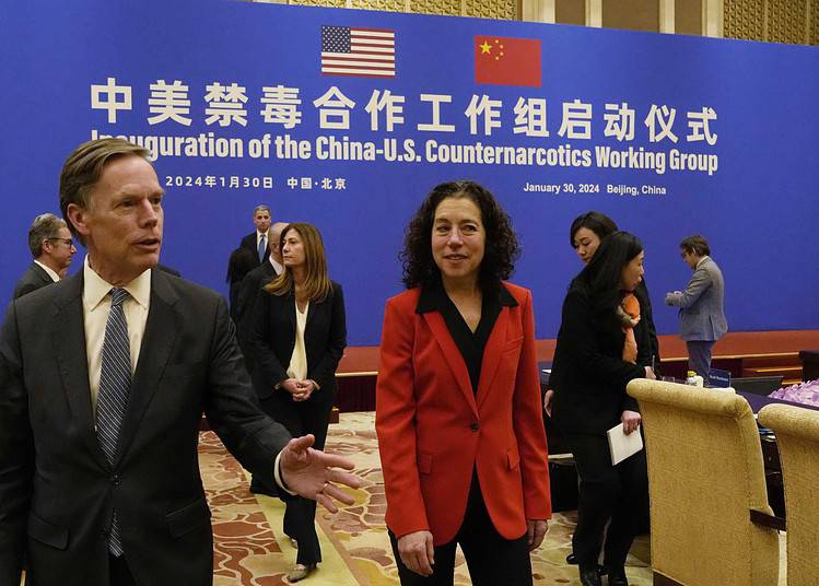 U.S. Deputy Assistant to the President and Deputy Homeland Security Advisor Jen Daskal, center, walks with U.S. ambassador to China Nicholas Burns after a launch ceremony at the Diaoyutai State Guesthouse in Beijing, Tuesday, Jan. 30, 2024. Daskal is leading an interagency U.S. delegation to Beijing to launch the U.S.-China Counternarcotics Working Group. (AP Photo/Ng Han Guan, Pool)