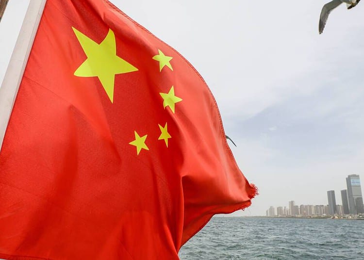 RUSSIA, LIAONING PROVINCE - MAY 21, 2023: A sailing catamaran flies a national flag in Dalian. The COVID-19 pandemic disrupted tourist exchange between Russias Primorye Region and China in 2020. Bus service resumed from January 8, 2023, the China National Tourism Administration unites efforts with Russia to renew the visa-free group travel agreement. Yuri Smityuk/TASS/Sipa USA/46575780/BF/2305281903