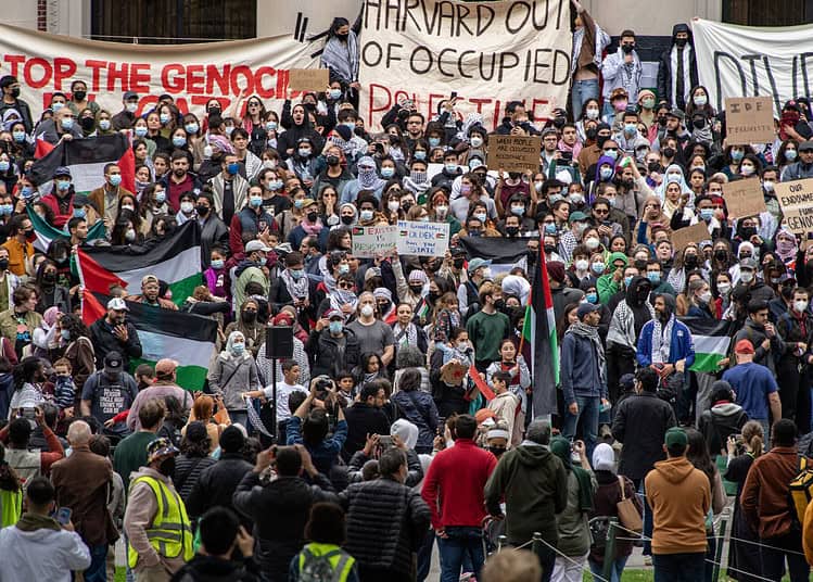 Supporters of Palestine gather at Harvard University to show their support for Palestinians in Gaza at a rally in Cambridge, Massachusetts, on October 14, 2023. - Thousands of Palestinians sought refuge on October 14 after Israel warned them to evacuate the northern Gaza Strip before an expected ground offensive against Hamas, one week on from the deadliest attack in Israeli history. (Photo by Joseph Prezioso / AFP)