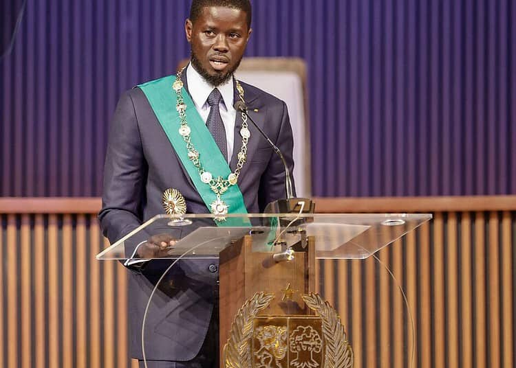 TOPSHOT - Bassirou Diomaye Faye speaks after being sworn in as Senegal's President at an exhibition centre in the new town of Diamniadio near the capital Dakar on April 2, 2024. Bassirou Diomaye Faye was sworn in on April 2, 2024 as Senegal's youngest president after sweeping to a first-round victory on a pledge of radical reform 10 days after he was released from prison. (Photo by John WESSELS / AFP)