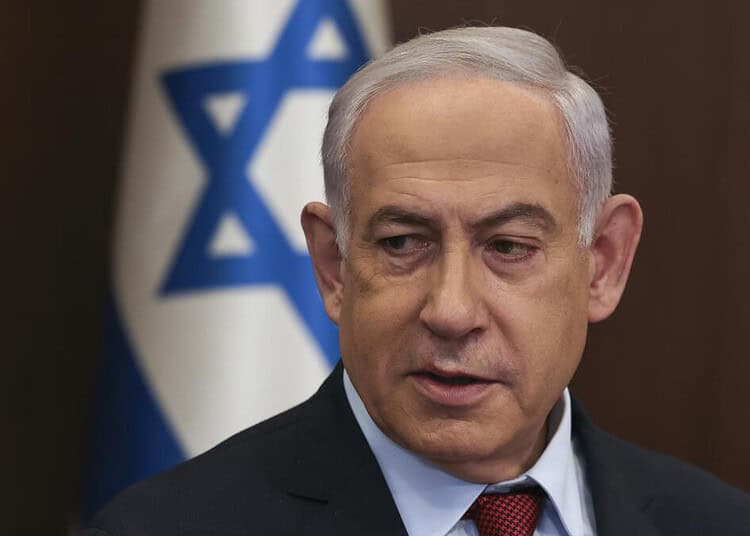 FILE - Israeli Prime Minister Benjamin Netanyahu attends the weekly cabinet meeting at the Prime Minister's office in Jerusalem, Dec. 10, 2023. A law that would make it harder to remove Netanyahu from office must go into effect only after the next parliamentary elections, the country's Supreme Court ruled Wednesday, Jan. 3, 2024, saying the legislation was clearly crafted for personal reasons. (Ronen Zvulun/Pool Photo via AP, File)