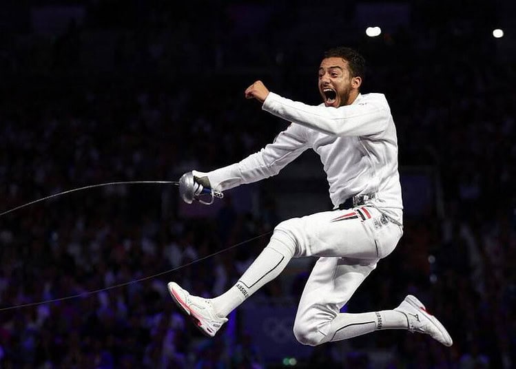 Egypt's Mohamed Elsayed celebrates as he competes against Hungary's Tibor Andrasfi in the men's epee individual bronze medal bout during the Paris 2024 Olympic Games at the Grand Palais in Paris, on July 28, 2024. (Photo by Franck FIFE / AFP)