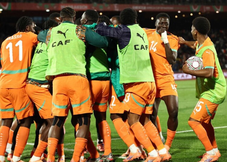 Ivory Coast players celebrate Ivory Coast's forward #24 Bazoumana Toure scoring the team's third goal during the Africa Cup of Nations (CAN) round of 16 football match between Ivory Coast and Burkina Faso at the Grand Stadium in Marrakesh on January 6, 2026. (Photo by Franck FIFE / AFP)
