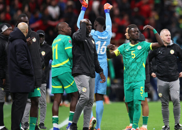 Soccer Football - CAF Africa Cup of Nations - Morocco 2025 - Final - Senegal v Morocco - Prince Moulay Abdellah Stadium, Rabat, Morocco - January 18, 2026
Senegal's Idrissa Gueye gestures to his teammates to leave the pitch after a penalty is awarded to Morocco REUTERS/Amr Abdallah Dalsh