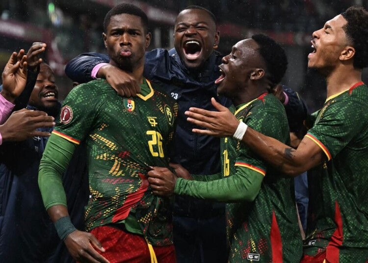 TOPSHOT - Cameroon's forward #26 Christian Kofane celebrates scoring his team's second goal during the Africa Cup of Nations (CAN) round of 16 football match between South Africa and Cameroon at Al Medina Stadium in Rabat on January 4, 2026. (Photo by Paul ELLIS / AFP)