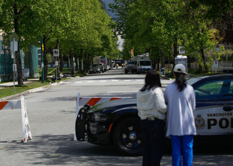 (250430) -- VANCOUVER, April 30, 2025 (Xinhua) -- People look at the site of the street festival in Vancouver, British Columbia, Canada, April 29, 2025. The suspect in Saturday night's deadly attack at Vancouver's Lapu Lapu Day festival has been charged with murder, police said Sunday.
The suspect, identified as 30-year-old Kai-Ji Adam Lo, has been charged with eight counts of second-degree murder. Interim Vancouver Police Chief Steve Rai said the driver does have a significant history of interactions with police and health-care professionals related to mental health. (Photo by Liang Sen/Xinhua)