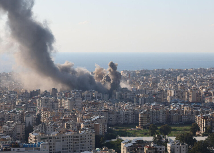 Smoke and dust rise after an Israeli strike on Beirut's southern suburbs, following an escalation between Hezbollah and Israel amid the U.S.-Israeli conflict with Iran, Lebanon, March 2, 2026. REUTERS/Mohamed Azakir