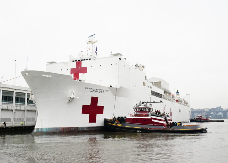 US Navy Hospital Ship arrives in Pier 90, New York City. It has a 1000 bed capacity which will be augmenting New York hospitals, in New York City, on March 30, 2020. US Navy Hospital Ship arrives at Pier 90, New York City. It has a 1000 bed capacity which will be augmenting New York hospitals, in New York City, on March 30, 2020. US Navy Hospital Ship arrives at Pier 90, New York City. It has a 1000 bed capacity which will be augmenting New York hospitals. (Photo by John Nacion/NurPhoto) (Photo by John Nacion / NurPhoto via AFP)